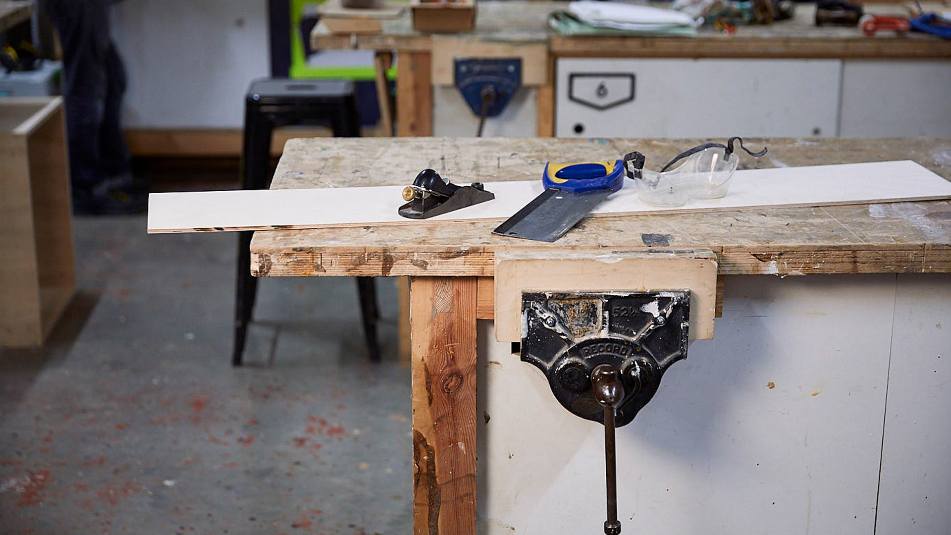 woodwork bench with vice in workshop bench space