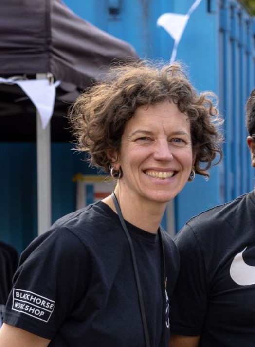 director wearing blackhorse workshop t shirt in black